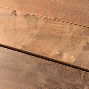 Water stains on composite board and exotic wood. Causes and maintenance