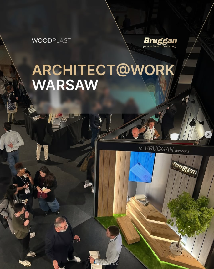 Overhead view of Architect@Work Warsaw trade show floor with attendees near the BRUGGAN decking booth and wooden display wall.